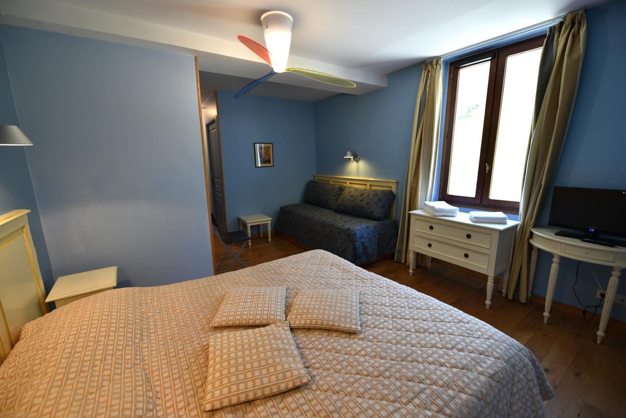 Les Lodges Du Lac Saint-Alban-de-Montbel Ruang foto